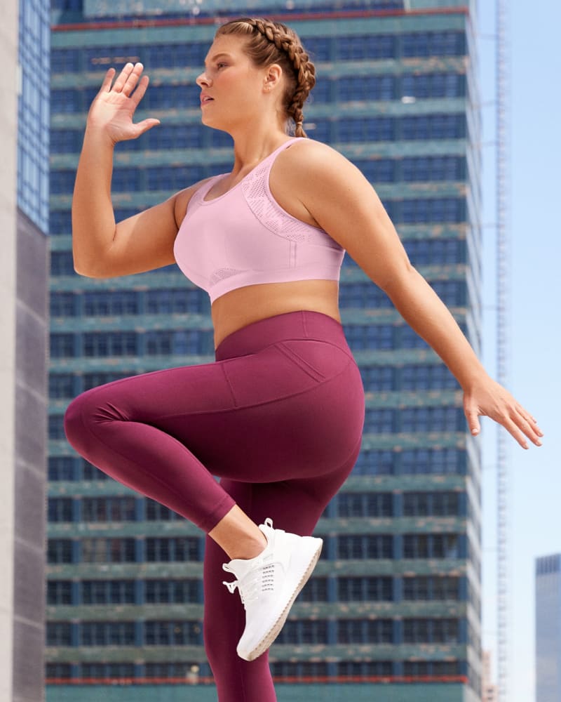 Front of a model wearing a size 36C No-Sweat Mesh Sports Bra in Pink by Glamorise Sport. | dia_product_style_image_id:263175